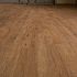 Laminate Flooring Installation Cost: Subfloor, Moisture, and Trim Items That Change the Bid
